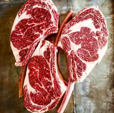 the Holy grail steak of steaks, Prime Tomahawk steak, grass-fed ribeye, farm raised, bone in
